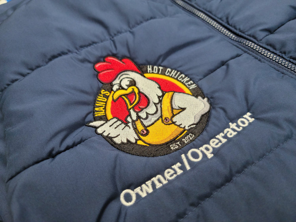 Nanu’s Hot Chicken logo embroidered on a padded jacket